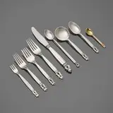 Georg Jensen, Acorn flatware service, sterling silver, stainless steel, sterling silver parcel-gilt