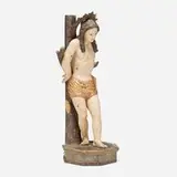 South American, Spanish Colonial figure of Saint Sebastian, painted and gilt wood, glass, brass
