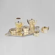 Tiffany Studios, Six-piece coffee and tea service with tray, c. 1910, silver plate, silver-plated copper, wood