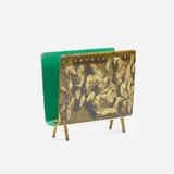 Bassorilievo magazine rack by Piero Fornasetti, c. 1950, lithographic transfer-print on lacquered wood, brass, sold Jul 2016