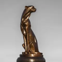 Jan Rosetta Schockner, Untitled, b.1945) Wild cat bronze 6cm wide 16cm deep 33cm high