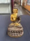 A Chinese, Untitled, bronze statue of seated buddha