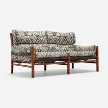 Arne Norell, Kontiki sofa, 1970, stained beech, upholstery, saddle-stitched leather, brass