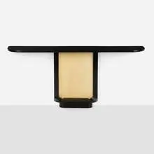 Jacques Adnet, Console table, c. 1940, lacquered wood, vellum, brass, reverse-painted glass