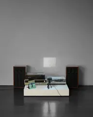 Francis Alÿs, Song for Lupita, 1998, video and sound installation with 60-minute animated film, vinyl player with 45 rpm record and sound element, projector, and two speakers