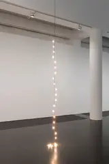Félix González-Torres, "Untitled" (Last Light), 1993, 24 light bulbs, plastic light sockets, electrical cord, and dimmer switch