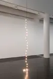 Félix González-Torres, "Untitled" (Last Light), 1993, 24 light bulbs, plastic light sockets, electrical cord, and dimmer switch