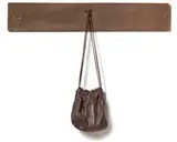 Marilyn Levine, Drawstring Bag with Rivets (#81-03H), 1981, Ceramic with leather string