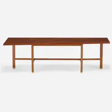 Coffee table by Edward Wormley, c. 1957, walnut, brass, sold Jul 2022