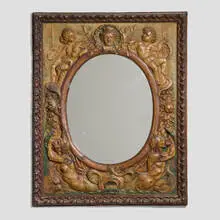 Victorian, Italian Classical-style wall mirror, c. 1900, painted and patinated embossed brass, mirrored glass