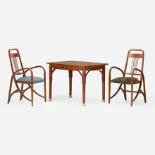 Thonet, Occasional table and two armchairs, model 511, c. 1904-10, walnut, brass, upholstery