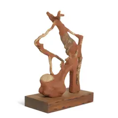 Wangechi Mutu, Heeler XVI, 2016, red soil, acrylic shoe, paper pulp, wood glue, rocks and wood