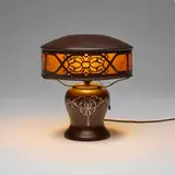 Overlay table lamp by Heintz Art Metal Shop, c. 1915, bronze, sterling silver, mica, sold Jul 2025