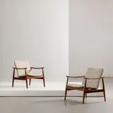 Senza titolo by A Pair Of Armchair By F. Juhl, offered Feb 2026
