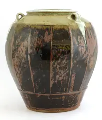 Phil Rogers, Phil Rogers (b.1951) a stoneware vase, three lug handles streaked with grey/white and with a green glaze