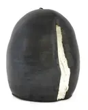 Dan Kelly, Dan Kelly (b.1953), a stoneware black-glazed vase with a thumb hole