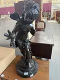 Auguste Moreau, Le Message, (Cherub), bronze on marble base, (approximate dimensions - overall: 28 H x 11 W x 12-3/4 D inches)