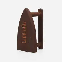 Cadeau by Man Ray, cast iron, steel tacks, sold Jun 2022