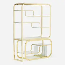 Milo Baughman, Étagère, c. 1990, brass-plated steel, glass