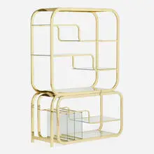 Milo Baughman, Étagère, c. 1990, brass-plated steel, glass