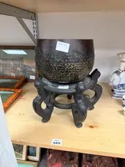 Untitled by Ebonized, bronze bowl and stand., offered May 2025