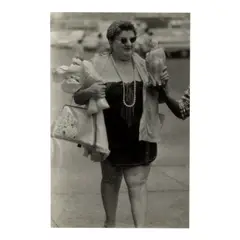 Untitled (Woman With Prizes, Coney Island, New York) by Diane Arbus, 1960, Gelatin silver print; the 'A Diane Arbus Print' stamp, sold Apr 2025