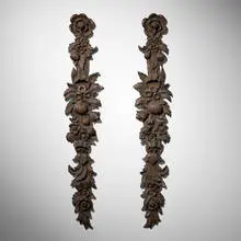 Wall ornaments with floral and foliate motifs, pair by Antique, carved wood, sold May 2025