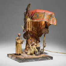 Anton Chotka, Orientalist figural table lamp with merchant and shopper