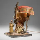 Anton Chotka, Orientalist figural table lamp with merchant and shopper