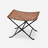 William Sheppee, Folding stool, c. 1985, painted wrought iron, leather strap