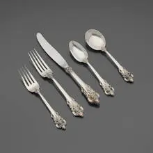 Grande Baroque flatware service by William S. Warren for Wallace Silversmiths, sold May 2025