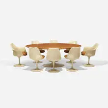 Eero Saarinen, dining set, 1956/1957, walnut, enameled steel, molded fiberglass, enameled aluminum, upholstery