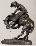 The Rattlesnake by Frederic Remington, Bronze, cast number 31, sold Apr 2017
