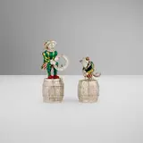 Gene Moore for Tiffany & Co., Trainer and monkey on barrels
