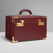 Claude Moliterni, Les Must de Cartier vanity case, c. 1975, leather, 24k gold-plated metal