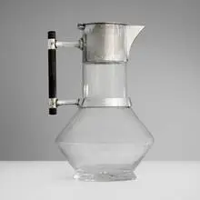 attribution Christopher Dresser, Claret jug, c. 1880, glass, silver-plated metal, ebony