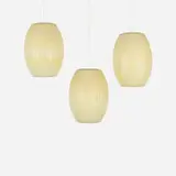 Bubble lamps, set of three by George Nelson & Associates, 1952, sprayed fiberglass over metal frame, steel, sold Feb 2016