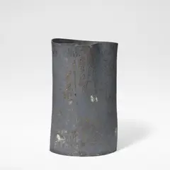 Unknown maker, Large pot, Earthenware, mottled dark grey and blue glazes with textured metallic surface, over a folded and squeezed body