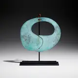 Untitled (Gong) by Harry Bertoia, c. 1975, patinated silicon bronze, enameled metal, leather cord, sold Apr 2022
