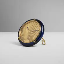'Art Déco' Lapis table clock by Claude Moliterni, c. 1989, brass, gilt brass, enameled metal, acrylic, sold Apr 2025
