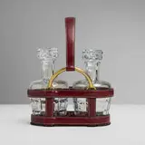 Jacques Adnet, Bottle holder with two Baccarat decanters