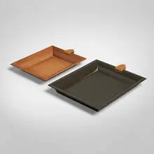 Hermès, Atrium trays, set of two, c. 2000, fruitwood, lacquered wood, leather