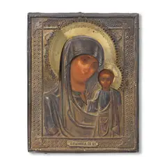 Icon of the Kazan Mother of God, maker's mark in Cyrillic 'F.I' for Ivan Fitikin, Moscow, 1880–1890, realistically painted in strong colours in a repoussé, chased and engraved silver-gilt oklad, 84 standard