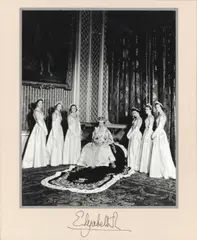 Cecil Beaton, The Queen with her Maids of Honour, 2 June 1953, Bromide print, mounted to card, the card signed by Her Majesty Queen Elizabeth II