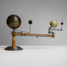 Planetarium / orrery by Trippensee Manufacturing Co., 1908, brass, steel, plated metal, wood, printed paper, painted wood, sold Apr 2025