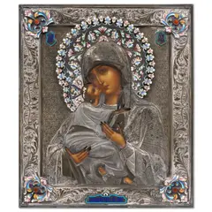 Icon of the Vladimir Mother of God, maker's mark in Cyrillic 'SJ', Moscow, 1908, realistically painted in silver-gilt chased and engraved oklad, applied with cloisonné enamel halo; corners and captions in champlevé enamel, 84 standard