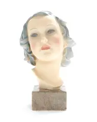 Le Bertetti, An Italian Ceramic Bust of a Woman, circa 1930, in a biscuit glaze