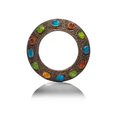 Mirror by Creaciones Gobesso, circa 1970, Of circular form, gilt moulded resin, set with polychrome glass cabochons, sold Mar 2025