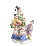 Meissen, Porcelain Figure Group, polychrome enameled and modeled as n Asian woman entertaining her children with drums, underglaze first quality mark,  ht