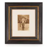 Edward S. Curtis, Three framed photogravures together with an Edward Curtis photography book Portraits from North American Indian Life.